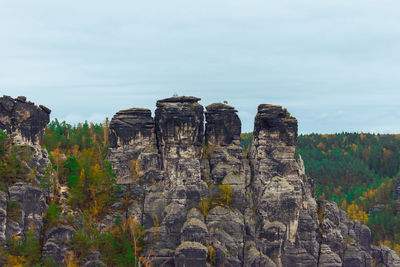 Rock formations on mountain against sky, saxon switzerland mountains