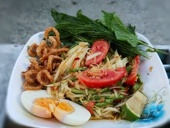 Close-up of breakfast served in plate