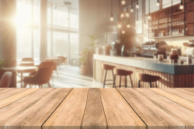 Close-up of wooden table at home