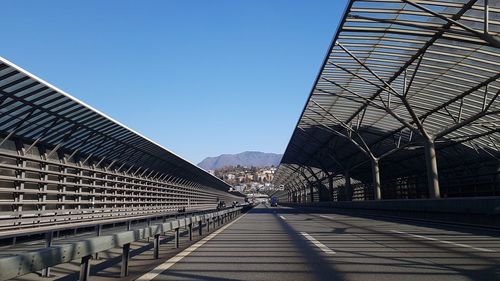 View of bridge against clear blue sky