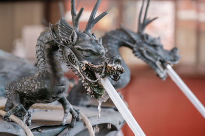 Close-up of statue against blurred background