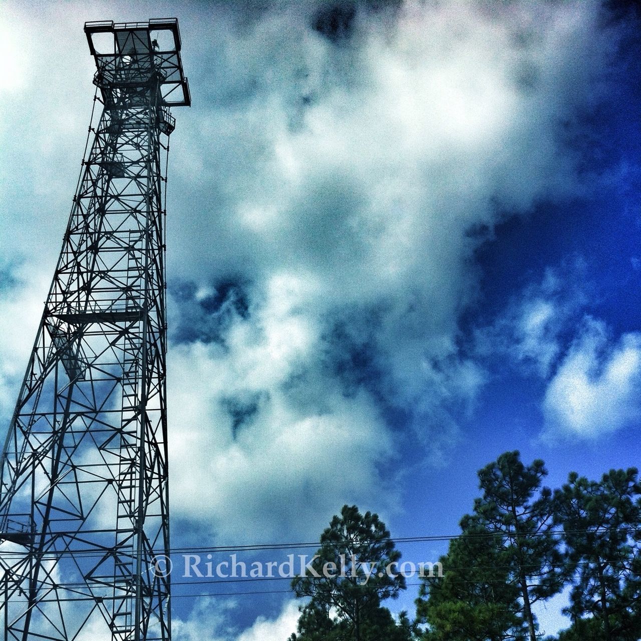 low angle view, sky, cloud - sky, cloudy, communication, electricity, tree, cloud, electricity pylon, connection, technology, weather, fuel and power generation, overcast, outdoors, day, silhouette, dusk, power supply, no people