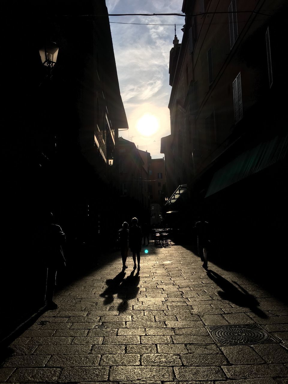 VIEW OF PEOPLE WALKING ON FOOTPATH