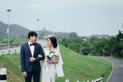 Young couple standing in park