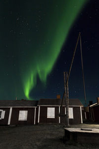 Low angle view of built structure against sky at night