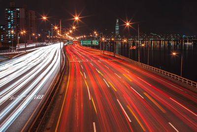 Light trails on city street at night