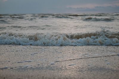 Scenic view of waves rushing towards shore