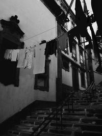Low angle view of clothes hanging on building