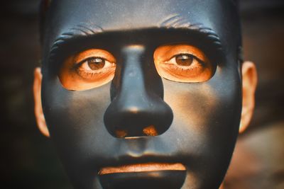 Portrait of man wearing mask outdoors