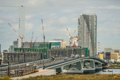 Modern buildings in city against sky