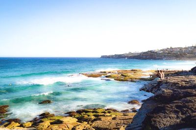 Scenic view of sea against clear sky