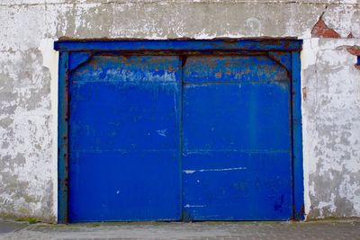 Close-up of blue closed door