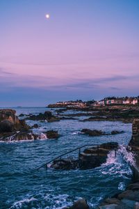 Scenic view of sea against sky at sunset