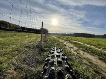 Scenic view of land against sky during sunset
