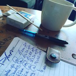 Close-up of paper on table