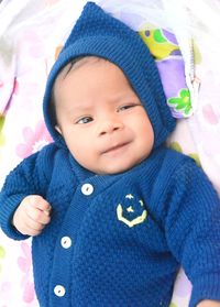 Portrait of cute baby girl in snow