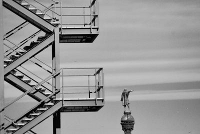 Low angle view of staircase against sky