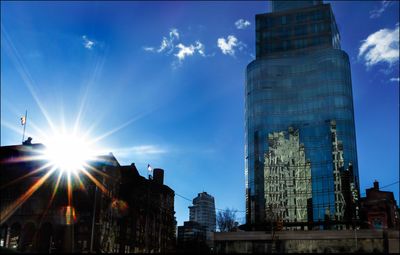 Low angle view of building against blue sky