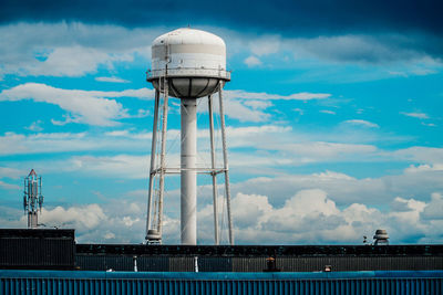 Low angle view of water tower against sky