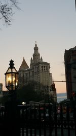 Built structure against clear sky at sunset