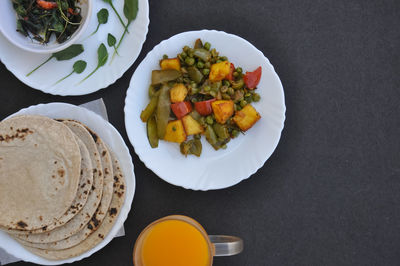 High angle view of breakfast served on table