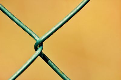 Close-up of chainlink fence against 8