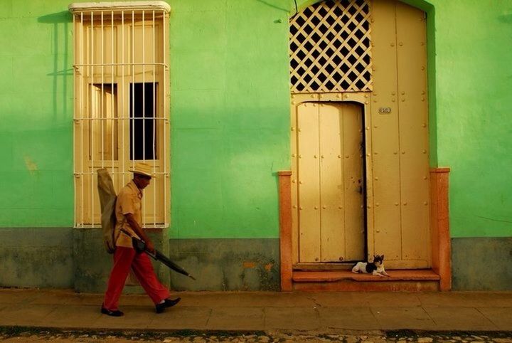 built structure, building exterior, architecture, full length, door, rear view, closed, lifestyles, house, side view, walking, wall - building feature, casual clothing, wall, men, day, leisure activity, street