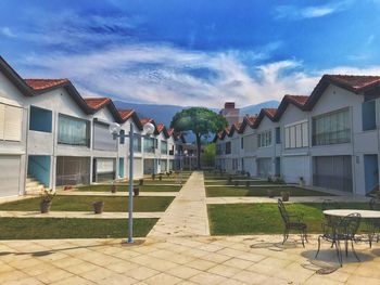 View of residential buildings against sky