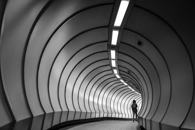 Low angle view of illuminated tunnel