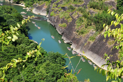 Photo of bamboo rafts drifting in rivers in wuyi mountain, fujian province, china