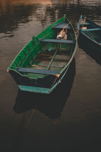 High angle view of boat moored in lake