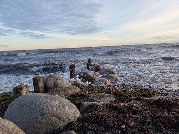 Scenic view of sea against sky during sunset