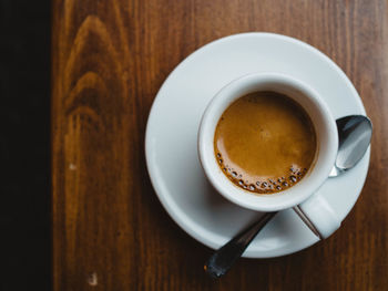 Directly above shot of coffee cup on table