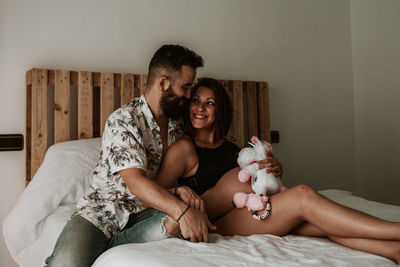 Young pregnant couple waiting for the baby. pregnancy session