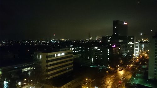 Illuminated cityscape at night