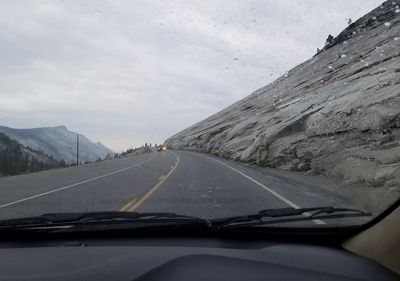 Road seen through car windshield