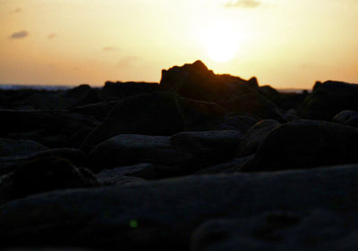 Close-up of rocks at sunset