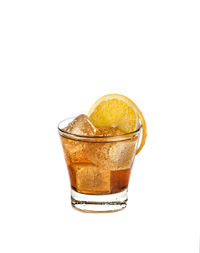 Close-up of beer glass against white background