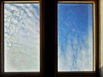 Reflection of clouds in glass window