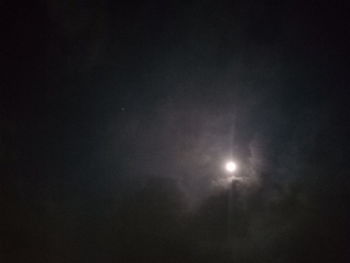 Low angle view of moon in sky at night