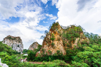 Low angle view of rocks against sky