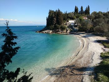 Scenic view of sea against clear blue sky