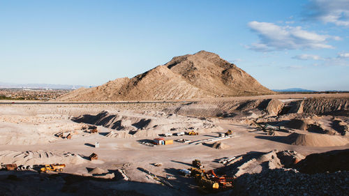 Quarry against sky on sunny day