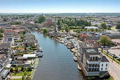 Aerial from the city bodegraven in the netherlands at the river the oude rijn
