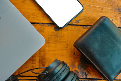 High angle view of mobile phone on table