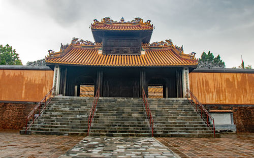 Exterior of temple against building
