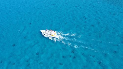 High angle view of ship sailing in sea