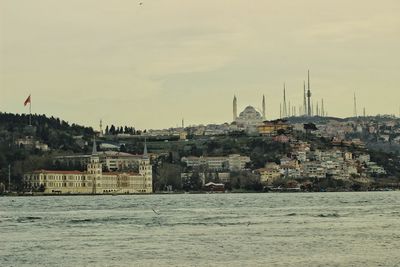 View of buildings in city at waterfront