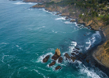 High angle view of rocks in sea