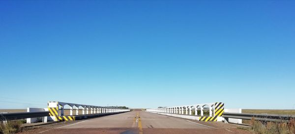 Bridge against clear blue sky